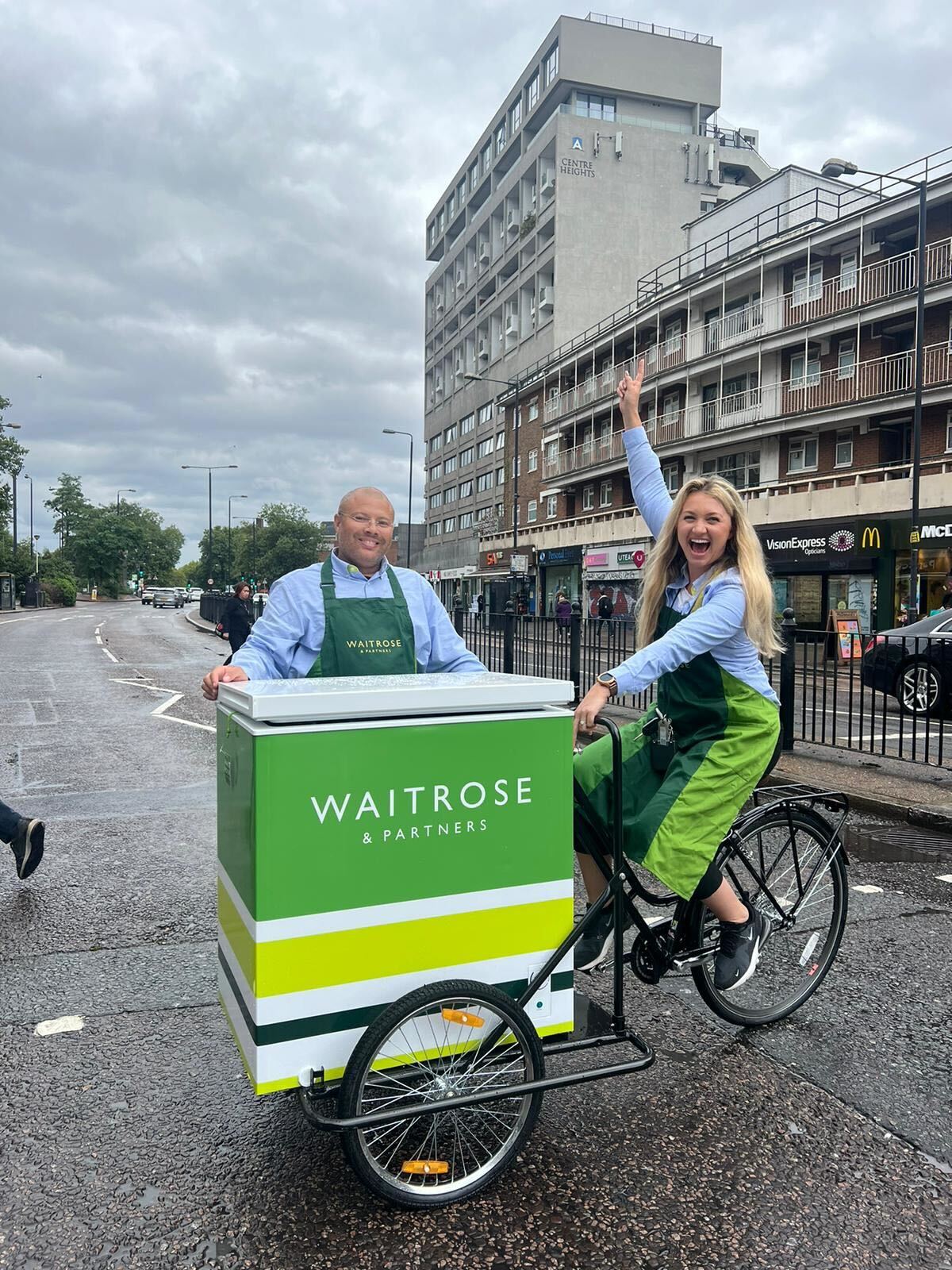 Team with sampling trike outside store